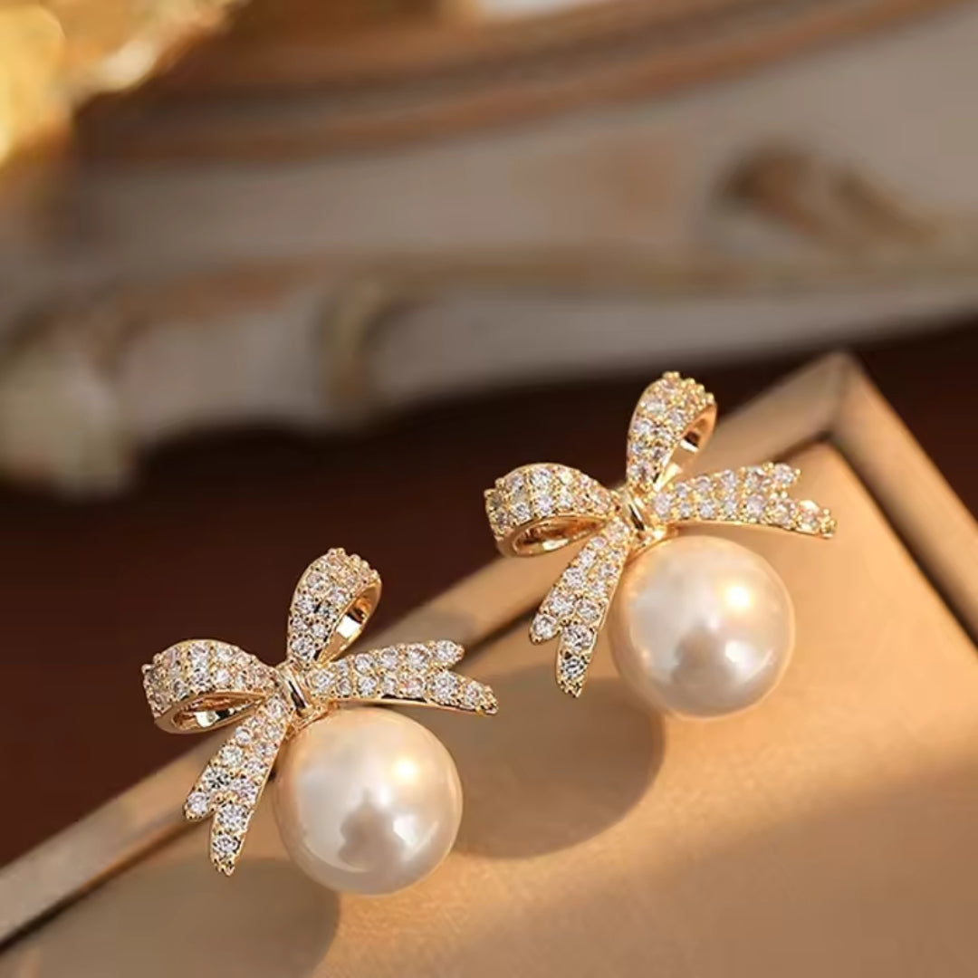 Gold Bow and Pearl Studs