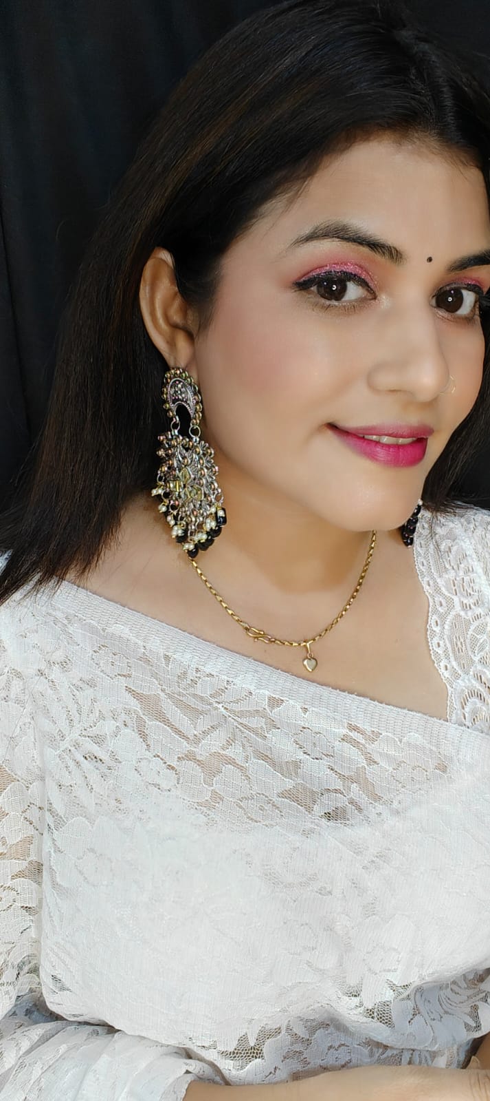 Metal Jhumkas Laden with Pearls