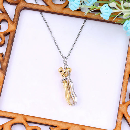 couple hug necklace
