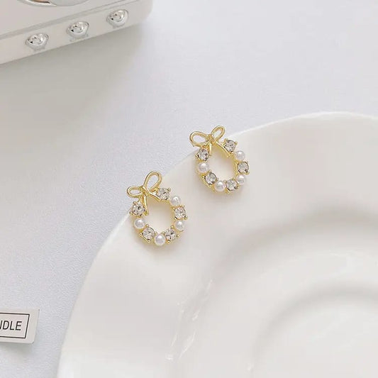 bow round Pearl Alloy Earrings