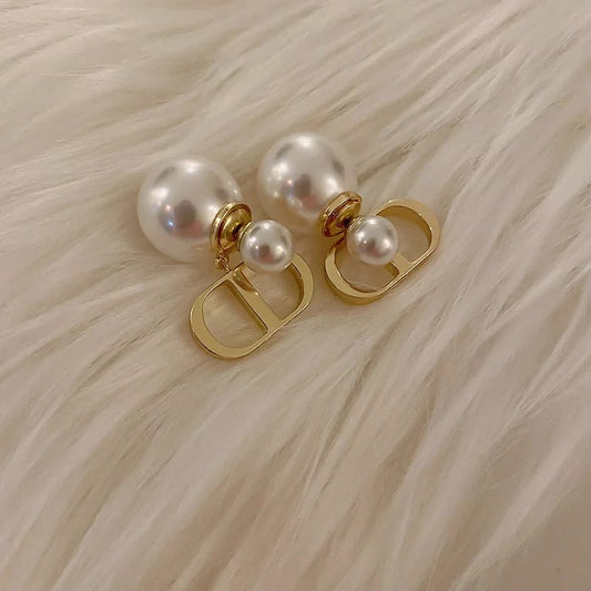 metal arc-shaped large pearl earrings