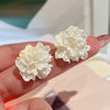 Trendy white flower earrings