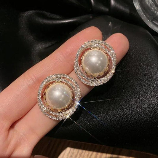 Spiral pearl earrings