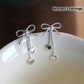 Amazing Silver Bow Heart Earrings