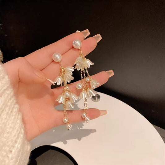 White bell long earrings