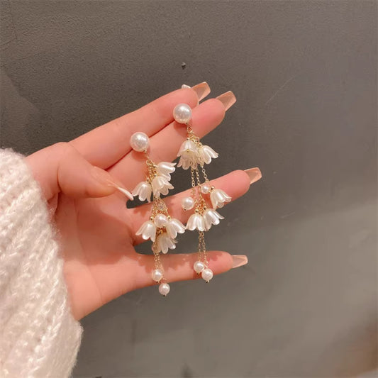 White bell long earrings