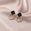 Black Triangle Stud Earrings