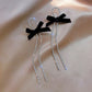 White Stone Black Bow Earrings