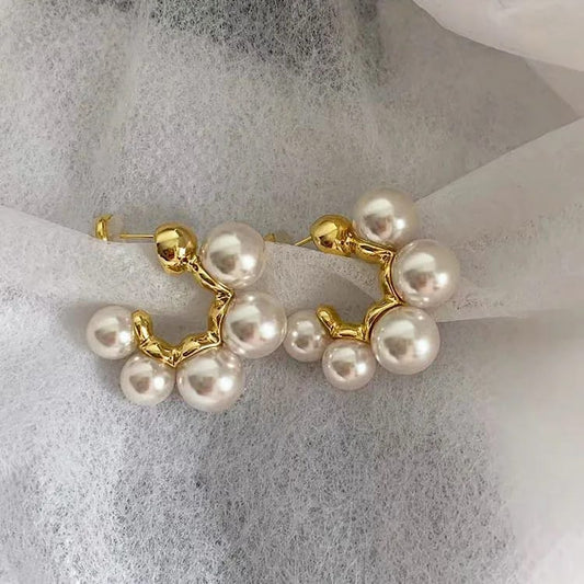 Pearl Of Wisdom  Round Earrings